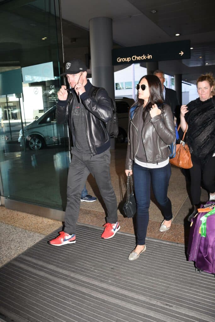 Stephen Amell and his wife.
