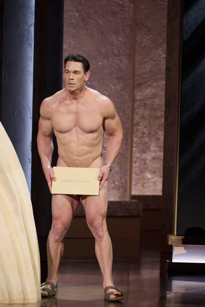March 10, 2024, Hollywood, California, USA: John Cena and Jimmy Kimmel present the Oscar for Costume Design during the live ABC telecast of the 96th Oscars at the Dolby Theatre at Ovation Hollywood on Sunday, March 10, 2024. 10 Mar 2024 Pictured: March 10, 2024, Hollywood, California, USA: John Cena presents the Oscar for Costume Design during the live ABC telecast of the 96th Oscars at the Dolby Theatre at Ovation Hollywood on Sunday, March 10, 2024. Photo credit: ZUMAPRESS.com / MEGA TheMegaAgency.com +1 888 505 6342 (Mega Agency TagID: MEGA1109164_004.jpg) [Photo via Mega Agency]