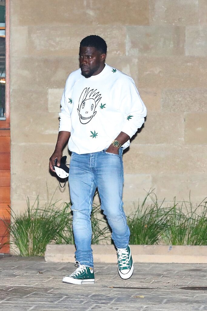 Kevin Hart and wife Eniko Parrish lounge at the Soho House