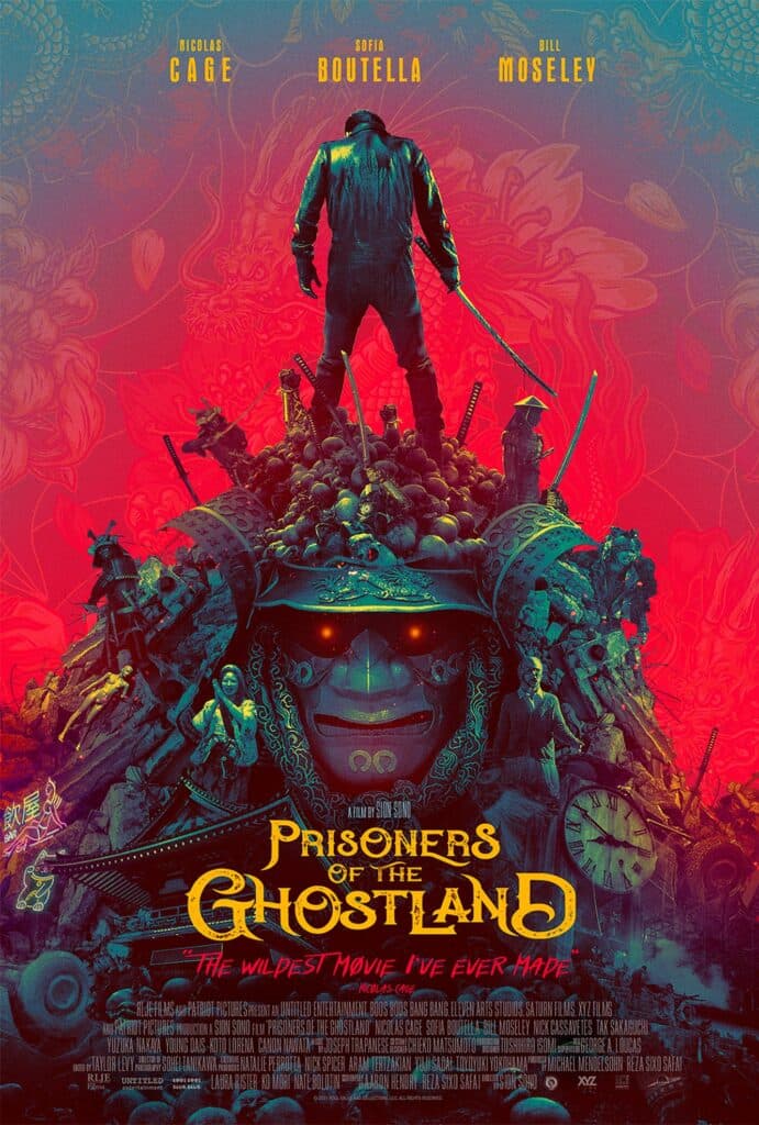 Prisoners of the Ghostland movie poster featuring Nicolas Cage standing atop a large ornate mask