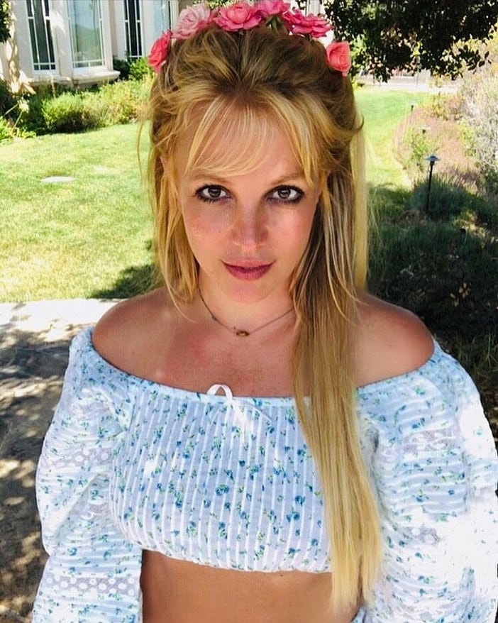 Britney Spears is having a buff beach bash 