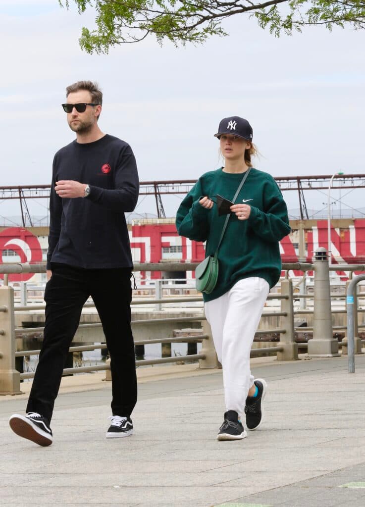 Jennifer Lawrence in sweats goes on a power walk with husband Cooke Maroney in Hudson River Park NYC