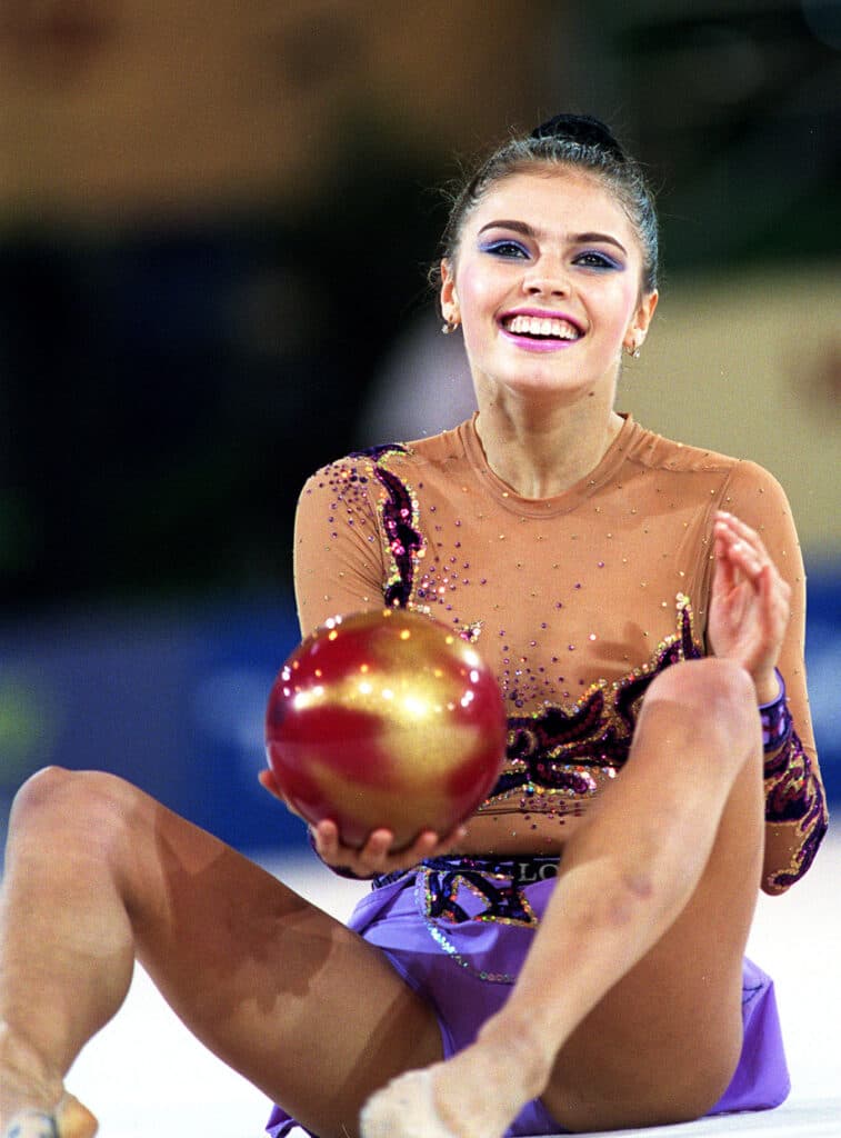 Alina Kabaeva of Russia reacts after her performance with the ball during the World Rhythmic Gymnastics Championships in Madrid October 21, 2001. Kabaeva won the gold medal. (Miguelez Sport/iPhoto.ca) (File size:7.07Mb) MADSPA10210102 Newscom/(Mega Agency TagID: iphotos004104.jpg) [Photo via Mega Agency]