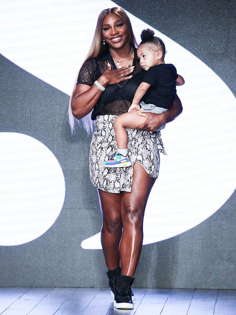 Serena Williams and Olympia on stage