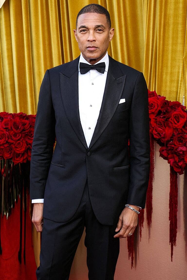 Him wearing a suit