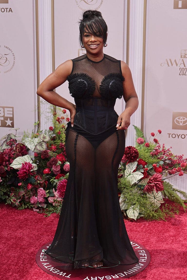 Kandi wearing black