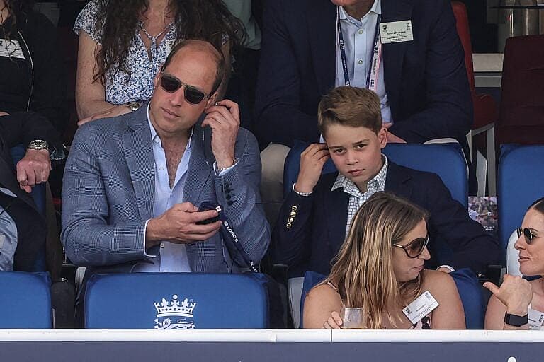 Prince William, Prince of Wales and Prince George of Wales celebrate the wicket of Pat Cummings of Australia during the LV= Insurance Ashes Test Series Second Test Day 4 England v Australia at Lords, London, United Kingdom,