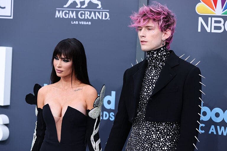 Megan Fox and Machine Gun Kelly hold hands