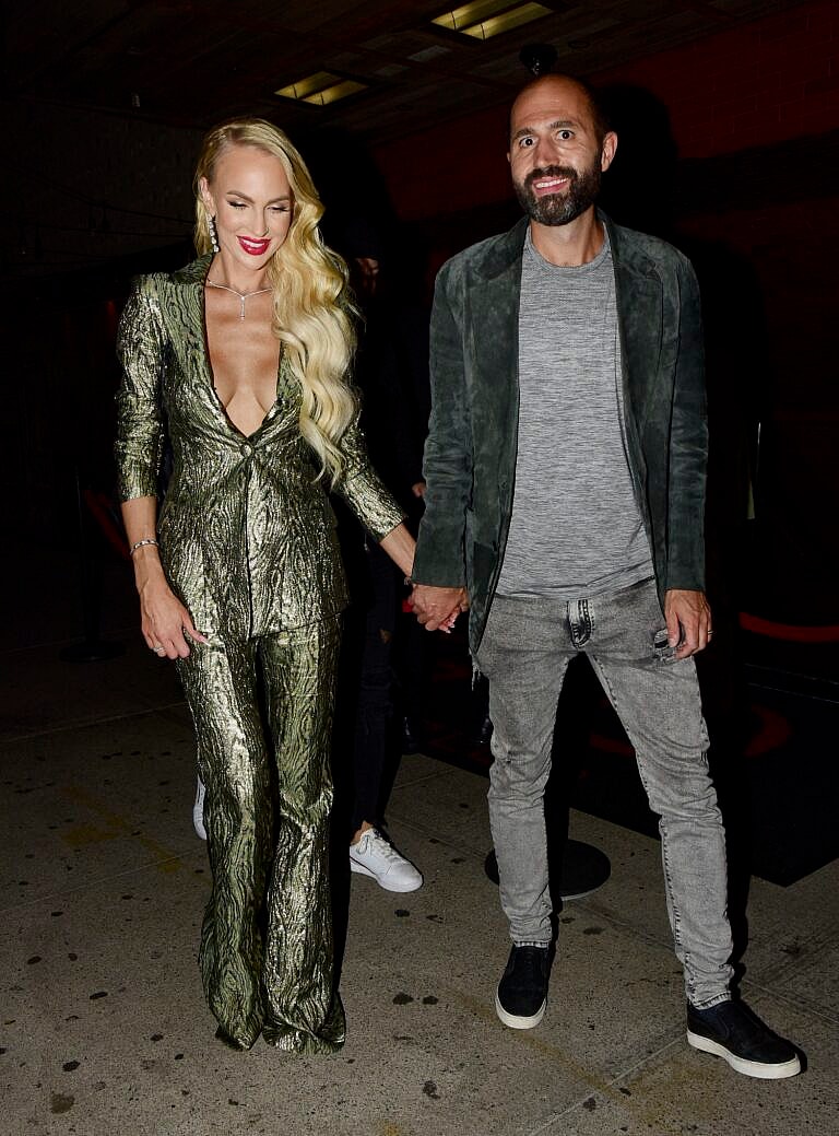 Christine Quinn and Christian Richard leave the TAO afterparty with husband Christian during fashion week NYC