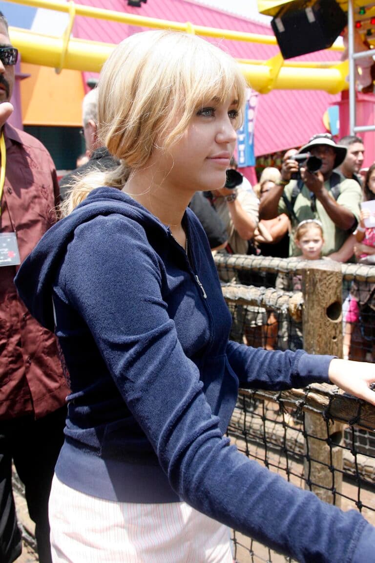 Miley Cyrus as Hannah Montana