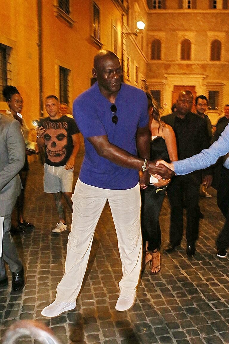 Michael Jordan and his wife Yvette Prieto are seen entering restaurant Pierluigi in Rome