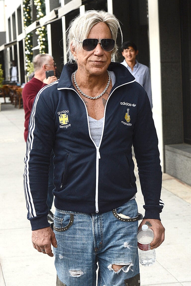 Mickey Rourke walking in Beverly Hills.