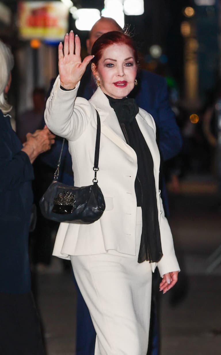 Priscilla Presley is all smiles waving while leaving the Late Show with Stephen Colbert tonight in New York City