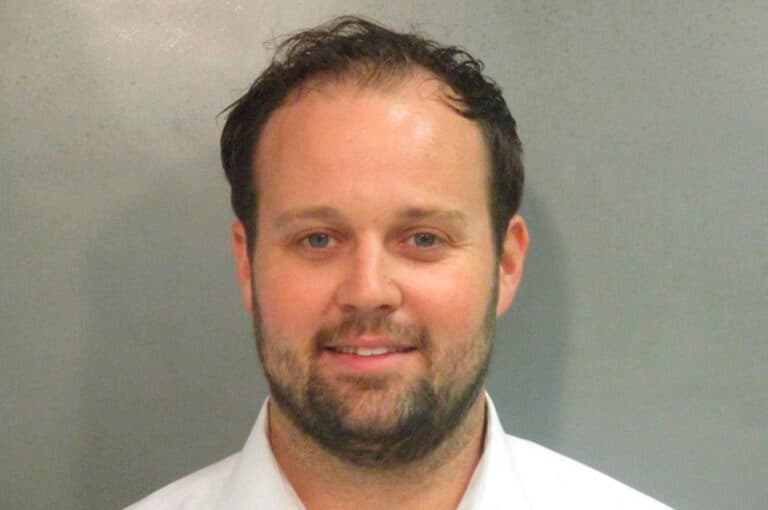 Josh Duggar smiles in new mugshot photograph after being found guilty in child pornography case
