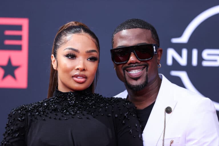 Ray J and Princess Love posing