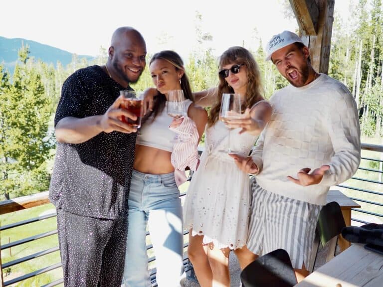 Travis Kelce poses with Taylor Swift