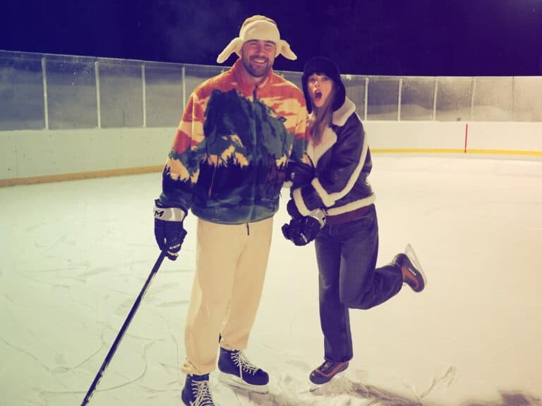 Travis Kelce poses with Taylor Swift