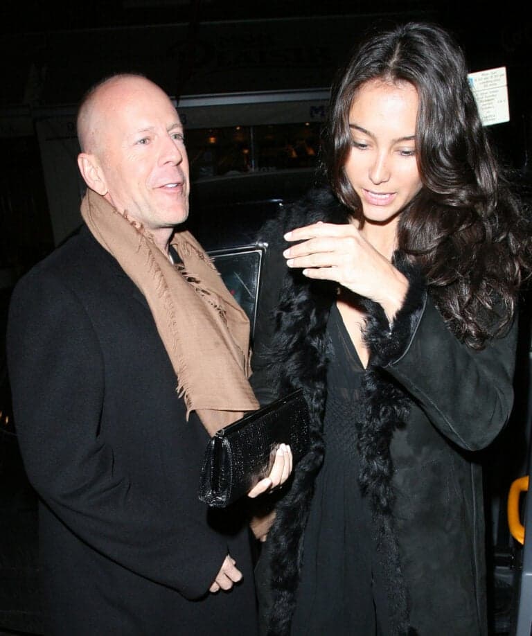 Bruce Willis and Emma Heming arrive back at the Covent Garden Hotel in a black cab having had had dinner at The Ivy restaurant