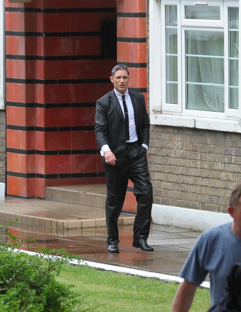 Tom Hardy and Emily Browning film scenes in the rain for their new film apos Legend apos in Hackney The film which follows the lives of notorious London gangsters The Krays was being filmed outside Cedra Court a block of flats which the twins lived in
