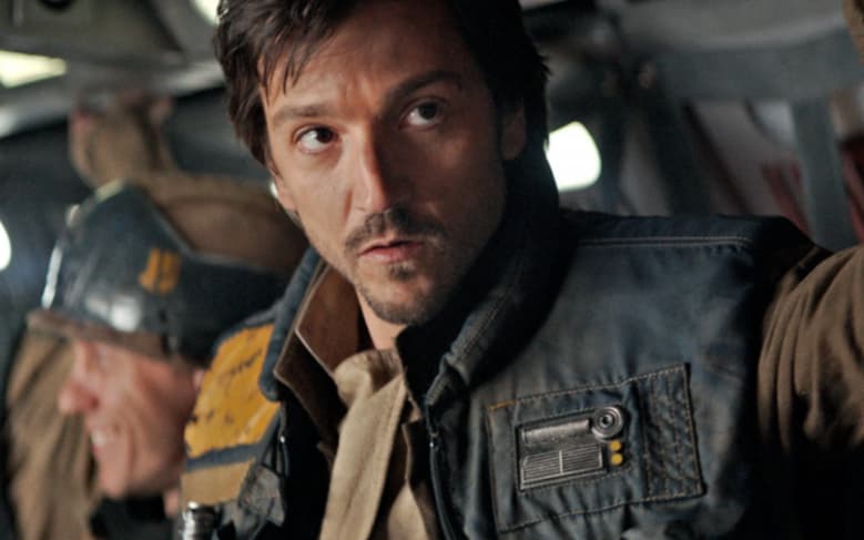 A character in a Rebel Alliance uniform from Star Wars, looking concerned in a spacecraft interior