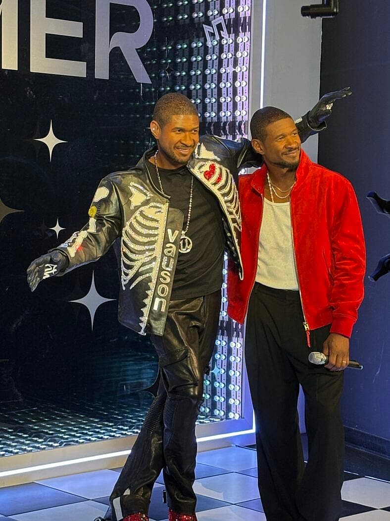 Usher and his wax figure