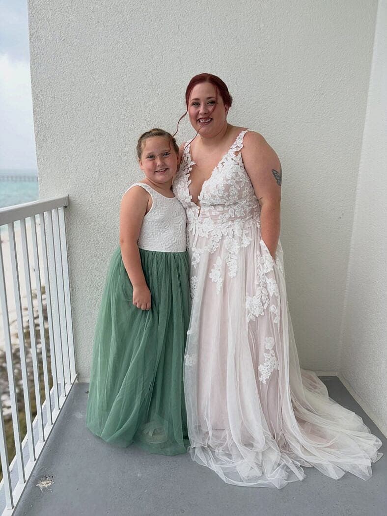Jessica Shannon posing in her wedding dress
