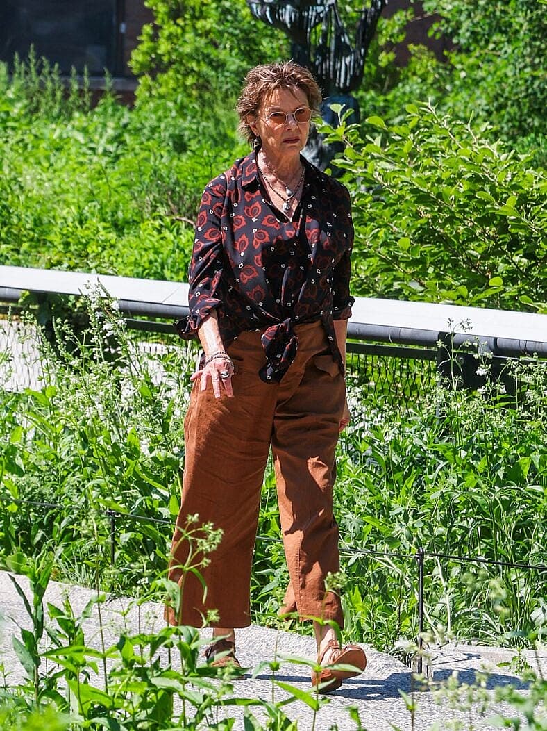 Annette Bening gets into character as she films scenes her upcoming comedy 42.6 Years this morning in New York City