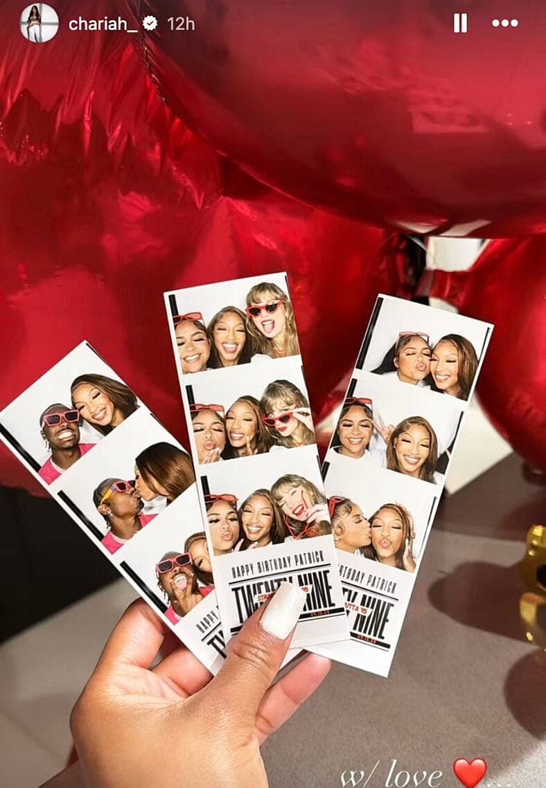 Chariah Gordon and Taylor Swift take photos in photo booth