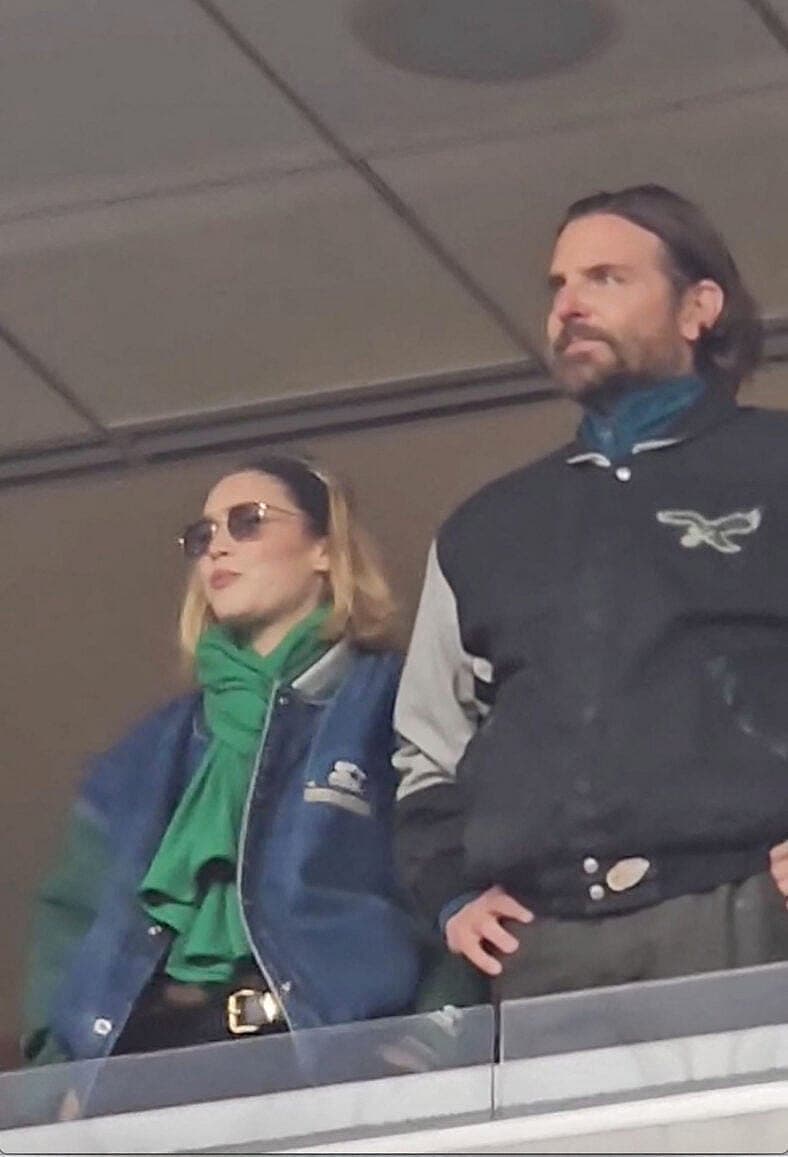 Ecstatic Bradley Cooper and Gigi Hadid celebrate a Philadelphia Eagles touchdown in their January 19 NFL playoff game