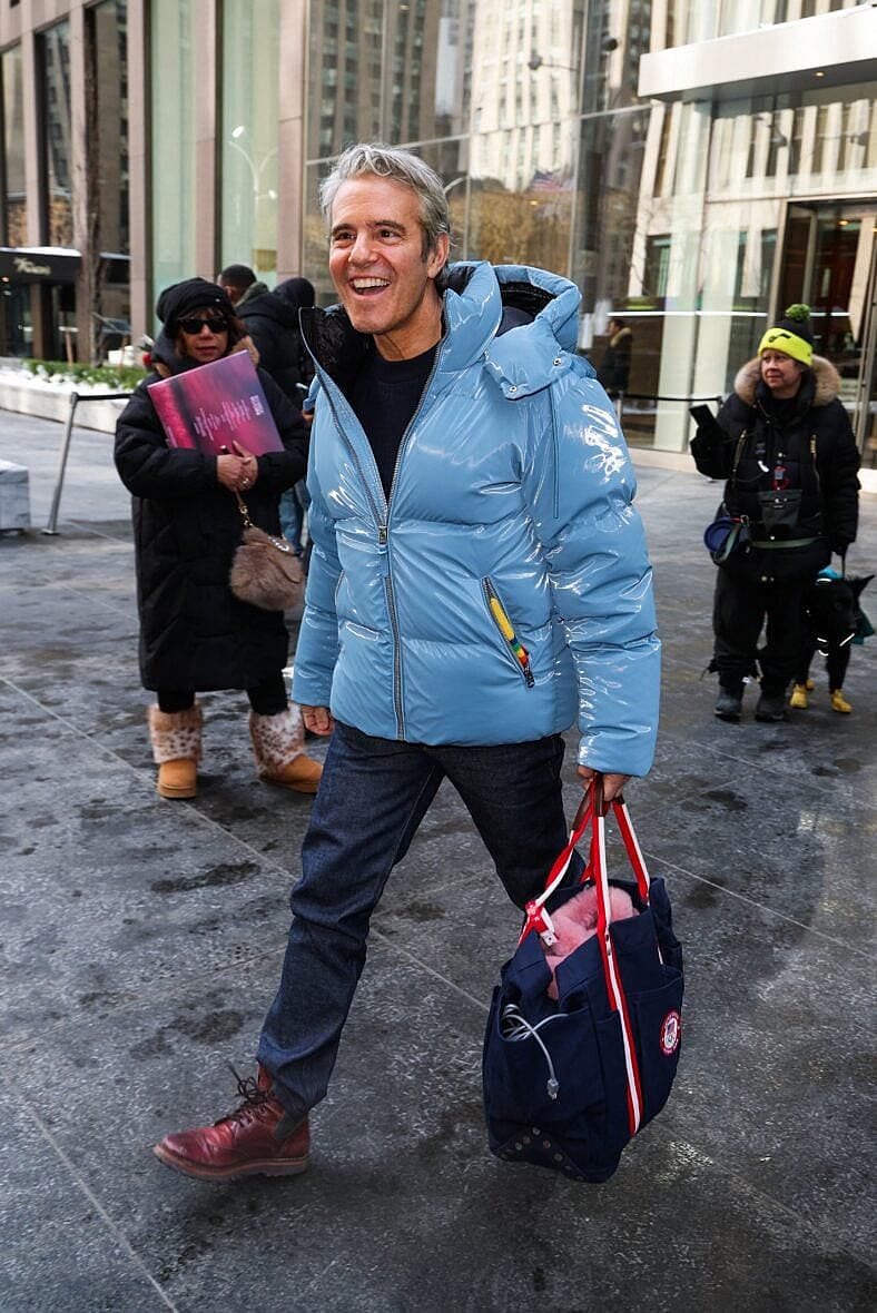 Andy Cohen is all smiles as he braves the cold wearing his Mackage winter coat while leaving SiriusXM Studios this afternoon in New York City