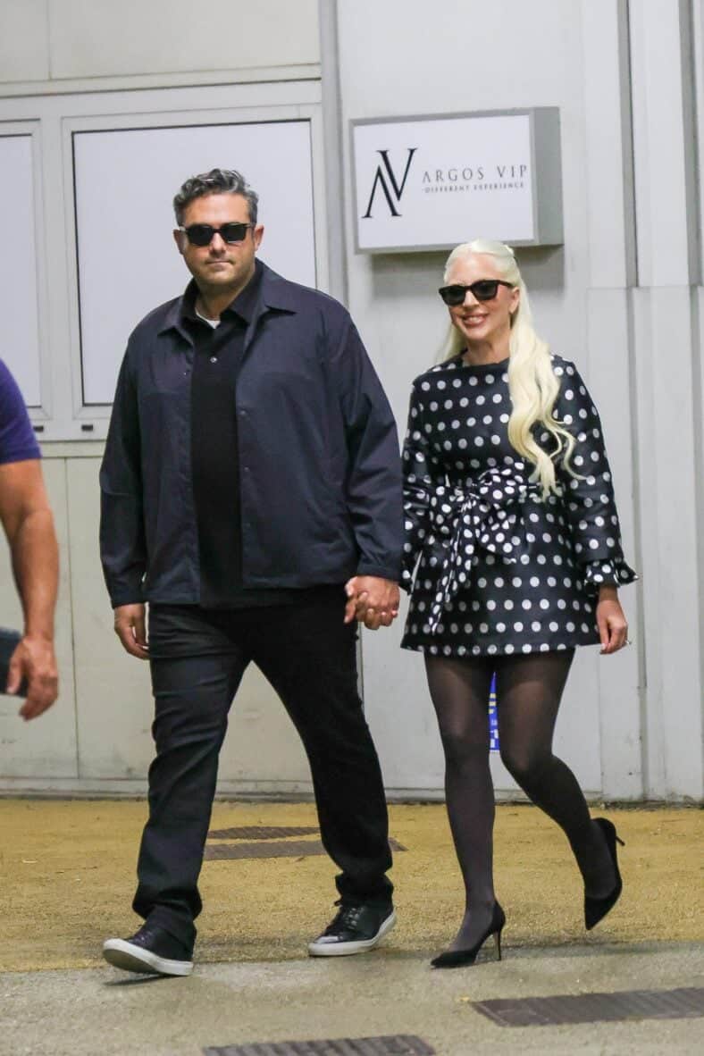 Lady Gaga and her fiance Michael Polansky made a stylish and affectionate entrance at the Venice Film Festival, arriving hand in hand and capturing the spotlight with their coordinated look and undeniable chemistry.
