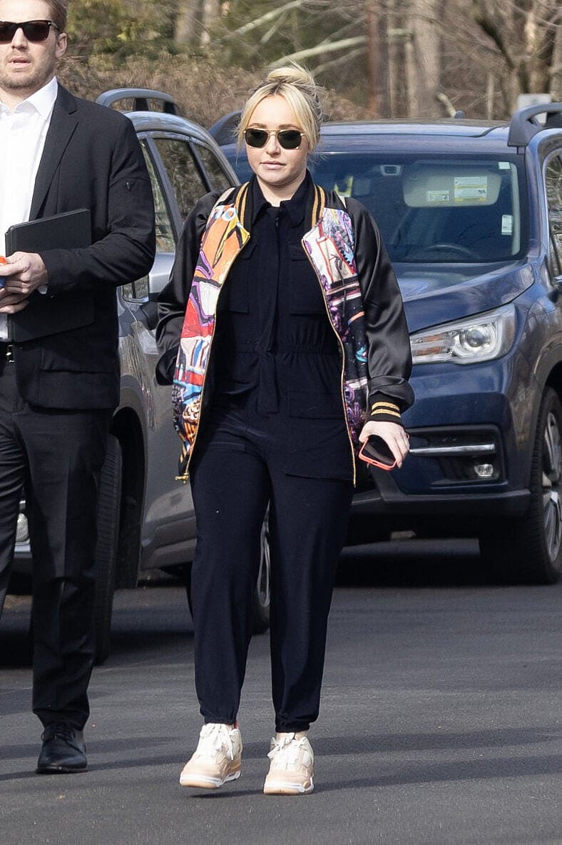 Hayden Panettiere arrives at her younger brother Jansen's celebration of life event in their hometown of Palisades, New York, with on/off boyfriend Brian Hickerson.