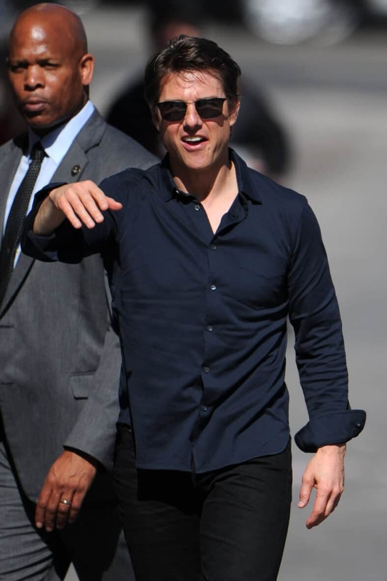 Tom Cruise greets fans wearing sunglasses and an open casual shirt in Hollywood!