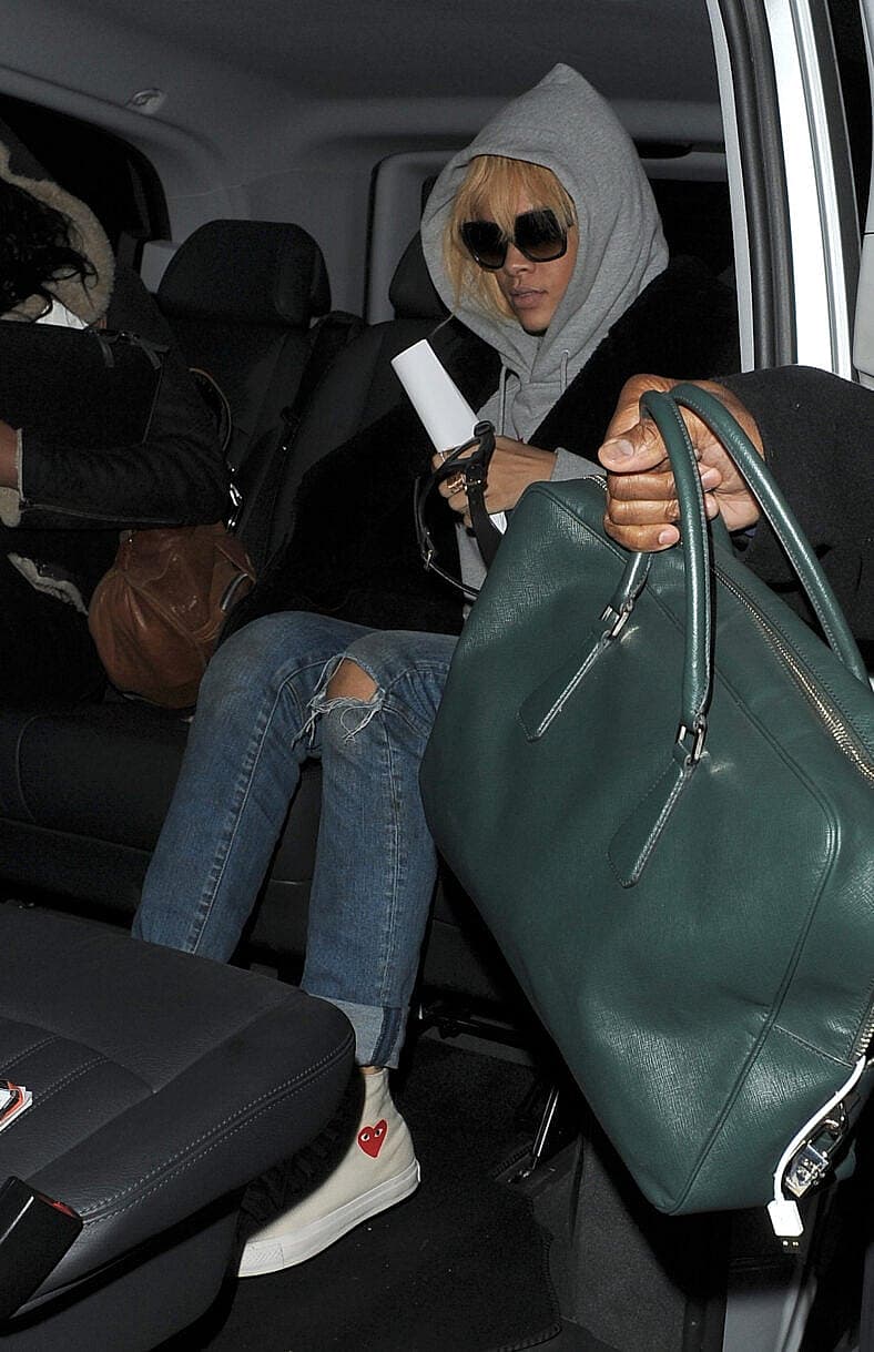 Rihanna leaving a music studio late at night looking tired and worn out.