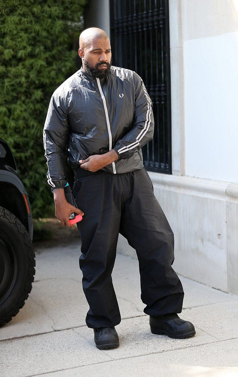 Kanye West is seen arriving solo at the studio