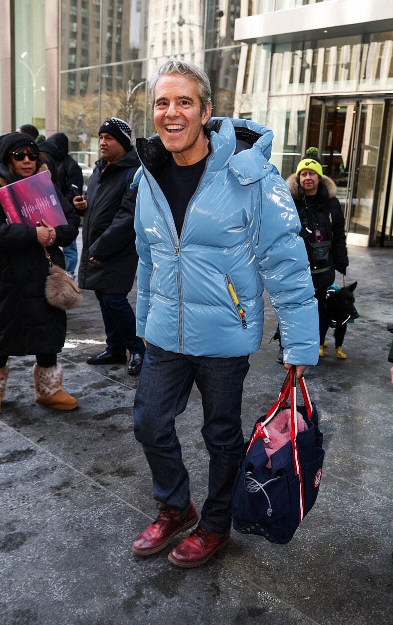 Andy Cohen is all smiles as he braves the cold wearing his Mackage winter coat while leaving SiriusXM Studios this afternoon in New York City