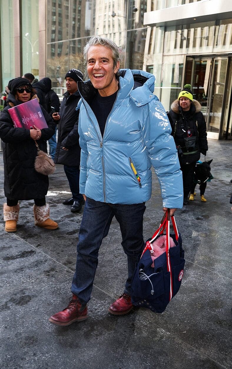 Andy Cohen is all smiles as he braves the cold wearing his Mackage winter coat while leaving SiriusXM Studios this afternoon in New York City