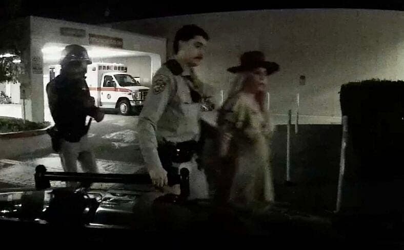 Britney Spears is seen being placed in Handcuff after cops pulling over the pop princess for allegedly speeding and swerving across lanes near the Los Angeles-Ventura County border