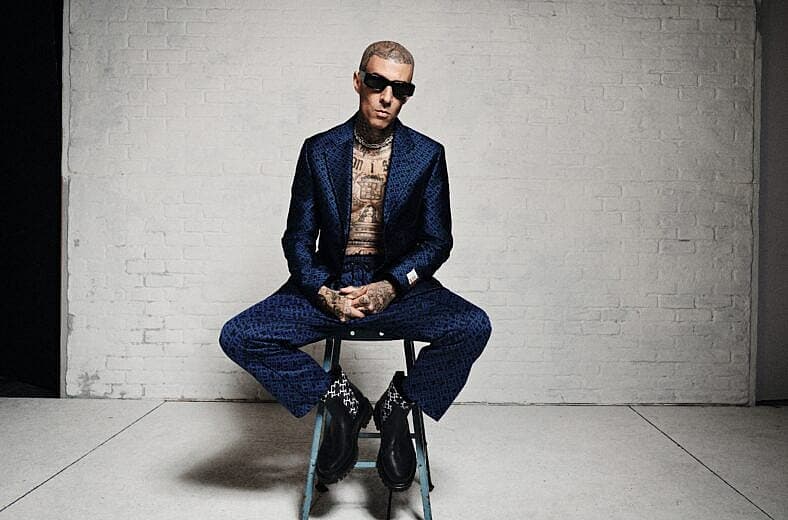 Travis Barker in a suit