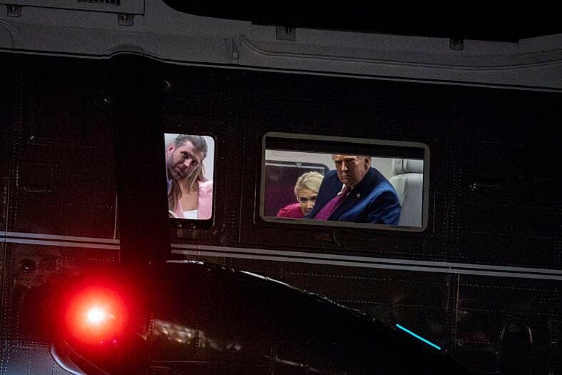 Eric Trump, Donald Trump, and Natalie Harp peek out of Marine One