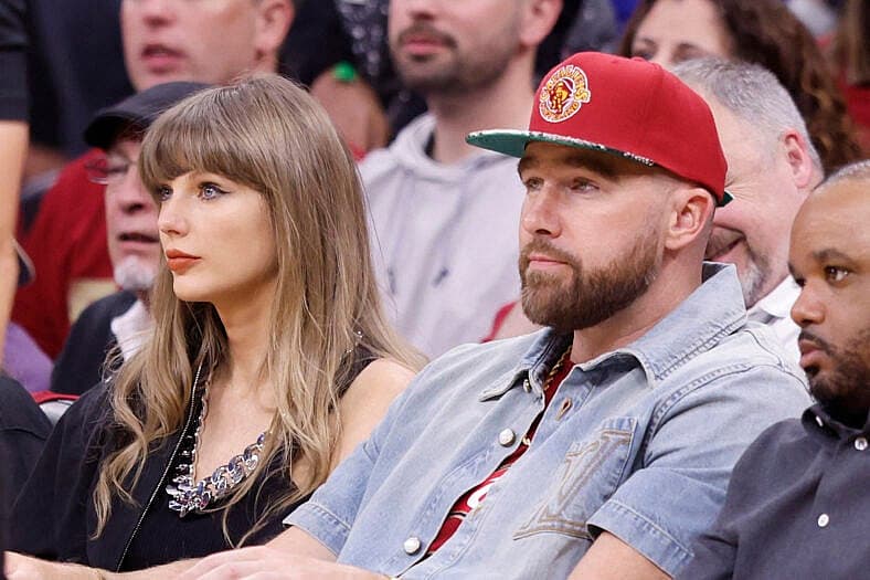 Taylor Swift and Travis Kelce attend The Knicks Game Against The Cavaliers in The Eastern Conference Finals Game 3