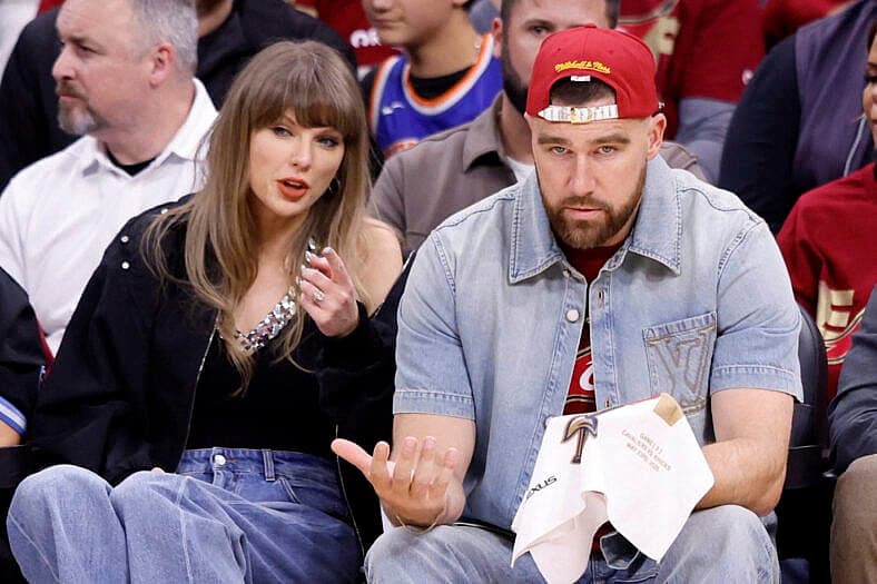 Taylor Swift and Travis Kelce attend The Knicks Game Against The Cavaliers in The Eastern Conference Finals Game 3