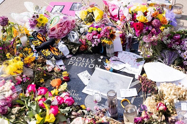 Tributes Left At Dolly Parton's Music City Walk Of Fame Star