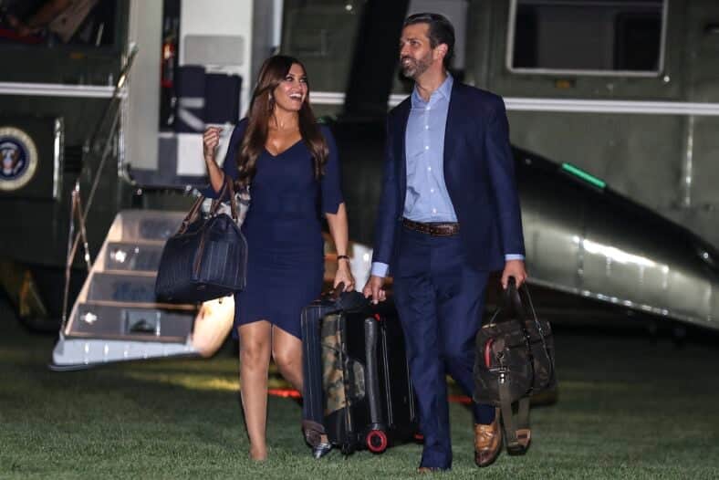 United States President Donald J. Trump waves to the media walks on the South Lawn of the White House as he arrives to the White House after a trip to Cincinnati on August 1, 2019 in Washington, DC. Credit: Oliver Contreras / Pool via CNP. 01 Aug 2019 Pictured: Donald J. Trump, Jr. and Kimberly Guilfoyle walk on the South Lawn of the White House as the arrive with President Donald Trump after a trip to Cincinnati on August 1, 2019 in Washington, DC. Credit: Oliver Contreras / Pool via CNP. Photo credit: Oliver Contreras - Pool via CNP / MEGA TheMegaAgency.com +1 888 505 6342 (Mega Agency TagID: MEGA477425_003.jpg) [Photo via Mega Agency]