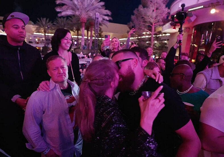 Taylor Swift and Travis Kelce dance and kiss at XS Nightclub as Kansas City Chiefs celebrate Super Bowl win