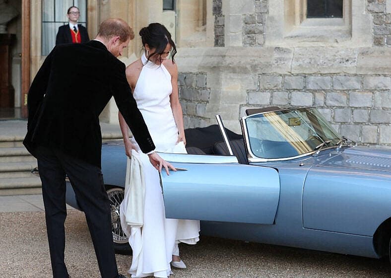 The Duke and Duchess of Sussex Prince Harry and Meghan Markle drive in an electric Jaguar car