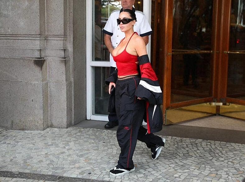Kim Kardashian spotted in Rio de Janeiro wearing Havaianas Flip Flops and white socks with a very small red tank top showing lots of skin