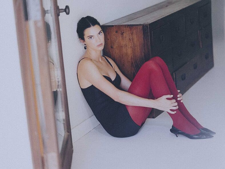 Leggy Kendall Jenner welcomes the holiday season in bold red Calzedonia tights
