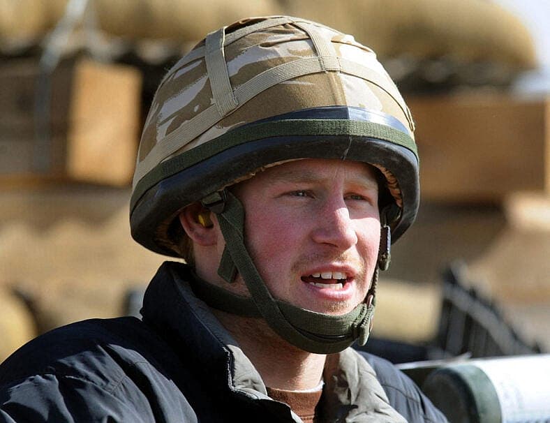 Prince Harry sits in an area of the observation post on JTAC Hill, close to FOB Delhi