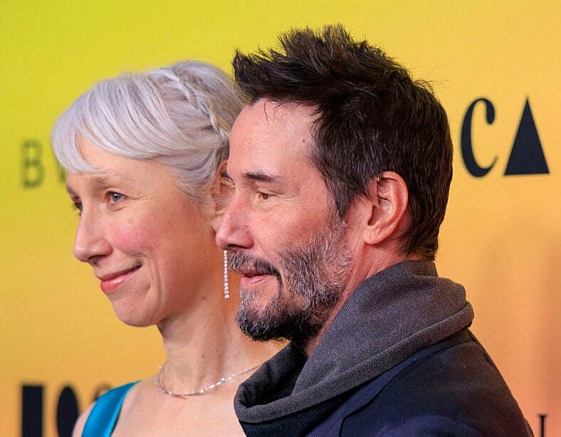 Alexandra Grant and Keanu Reeves on the red carpet